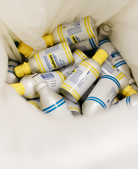 aluminium gas anaesthesia bottles in recycling bin